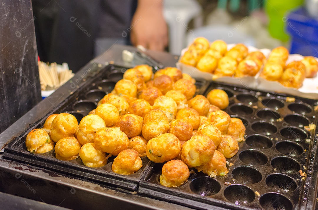 Process for cooking takoyaki most popular delicious snack in japan.