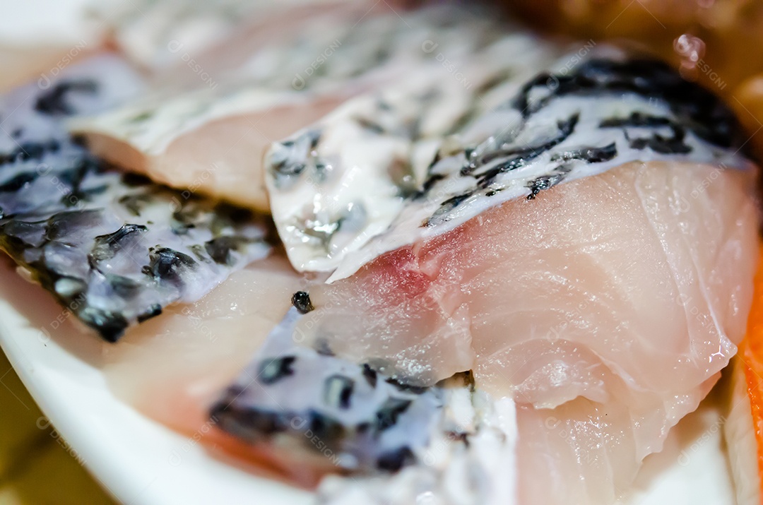 Fechar o slide de peixe fresco.