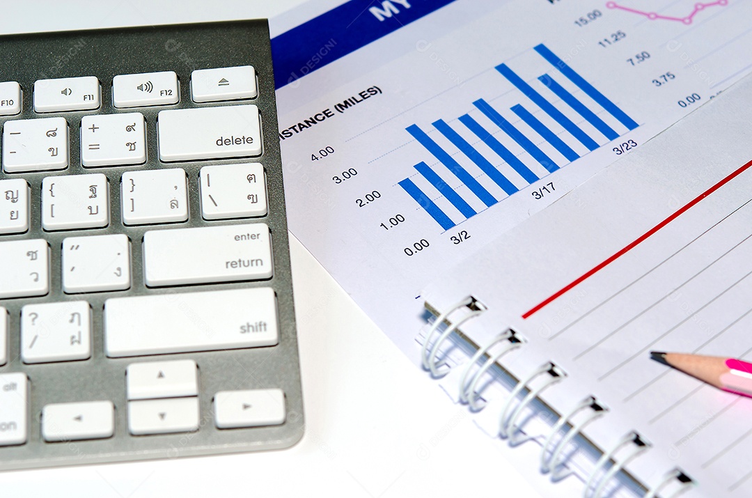The business chart and the book are placed on the table.