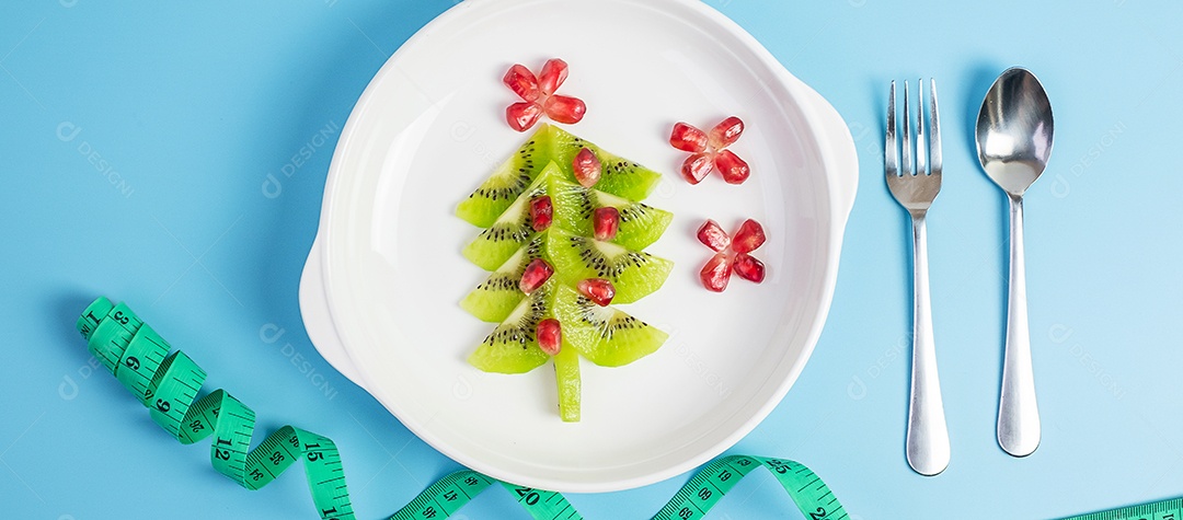 Árvore de Natal de frutas; Semente de kiwi e romã com garfo