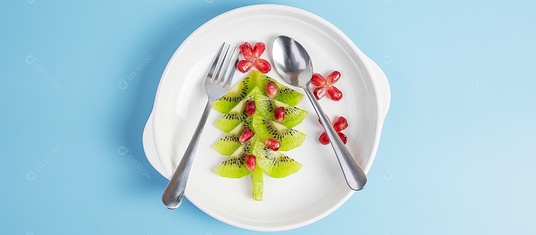 Árvore de Natal de frutas; Semente de kiwi e romã com garfo