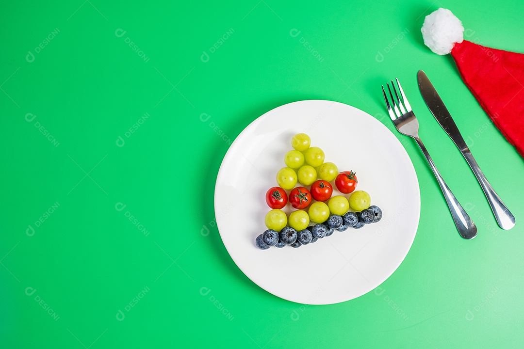 Árvore de Natal de vegetais e frutas orgânicas; Mirtilos, garra