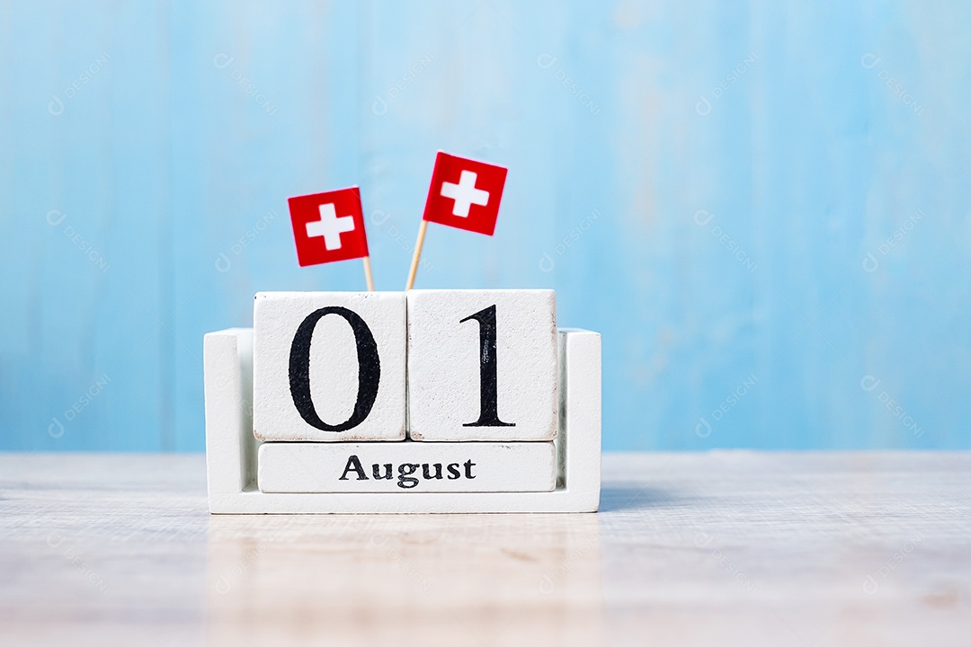 August 1 wooden calendar with miniature flags of Switzerland. Swiss National Day and Happy Celebration Concepts