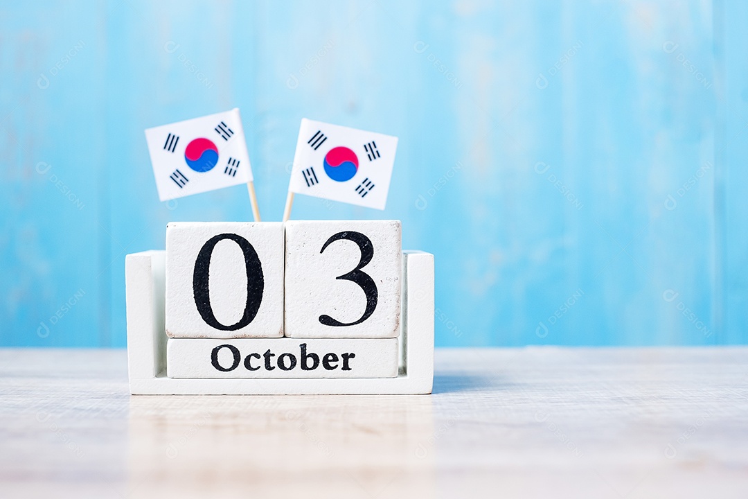 Calendário de madeira de 3 de outubro com bandeiras em miniatura da República da Coreia. Dia da Fundação Nacional, Gaecheonjeol, feriado público da nação e conceitos de celebração feliz
