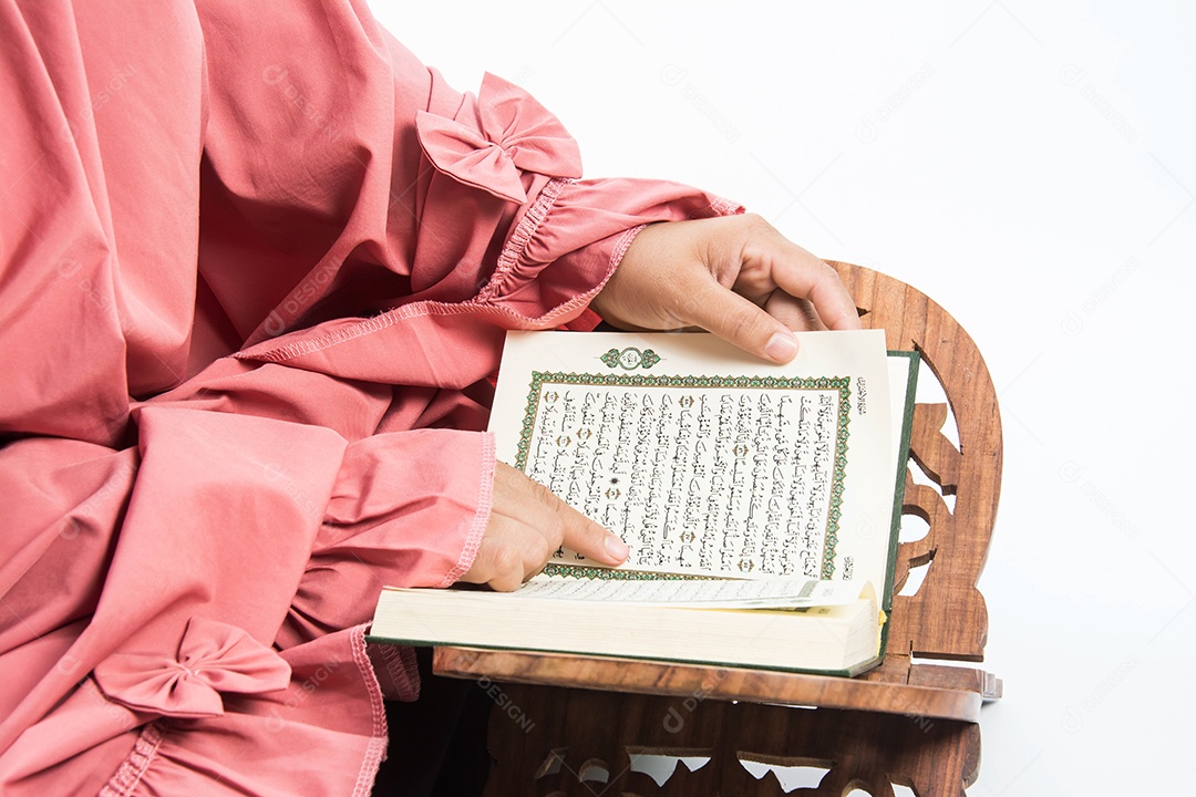 Quran in hand - holy book of muslims (public item of all muslims) quran in hand muslim woman