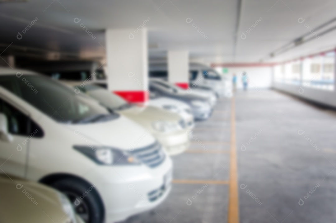 Carro de estacionamento de desfoque abstrato interno para plano de fundo.