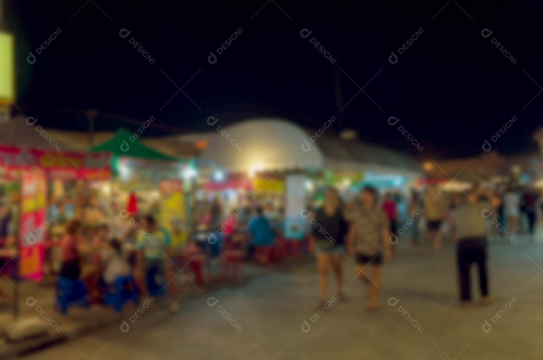 Desfocar o fundo do mercado noturno.
