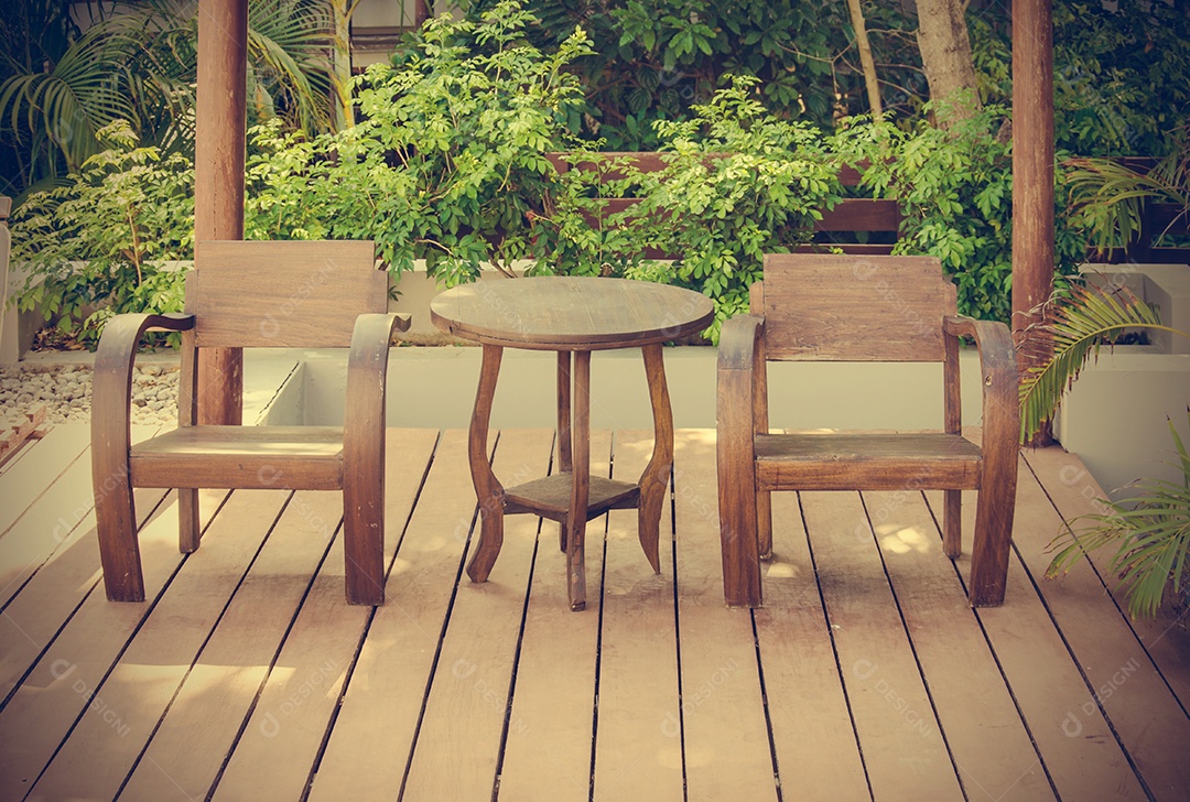 Wooden chairs on wooden floor.