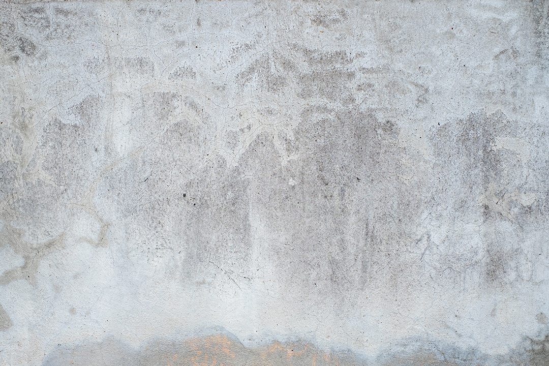 Velho muro de concreto na cor preto e branco, parede de cimento, quebrado