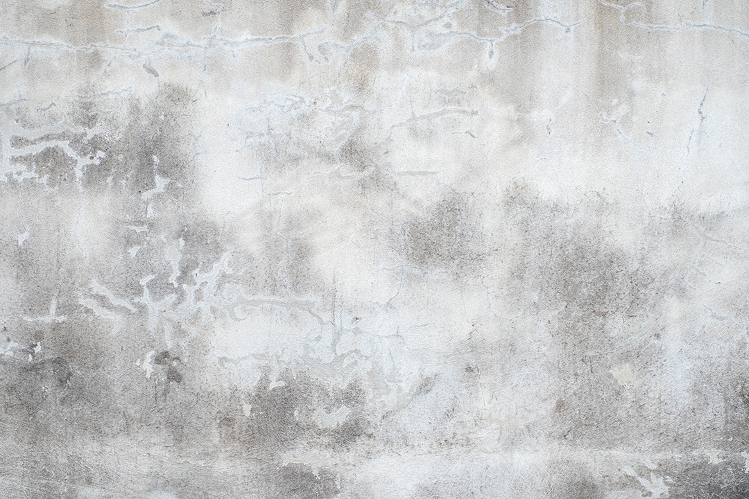 Velho muro de concreto na cor preto e branco, parede de cimento, quebrado