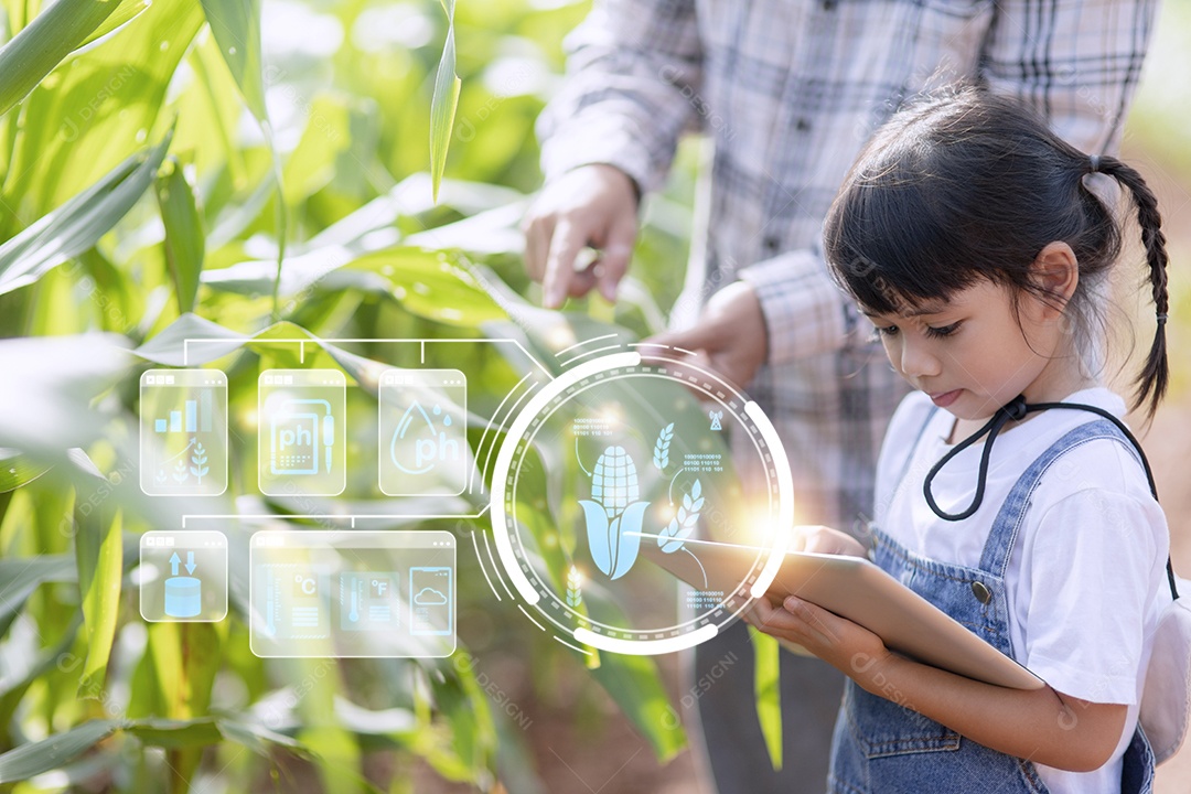 A menina usando um tablet para analisar o crescimento das plantas