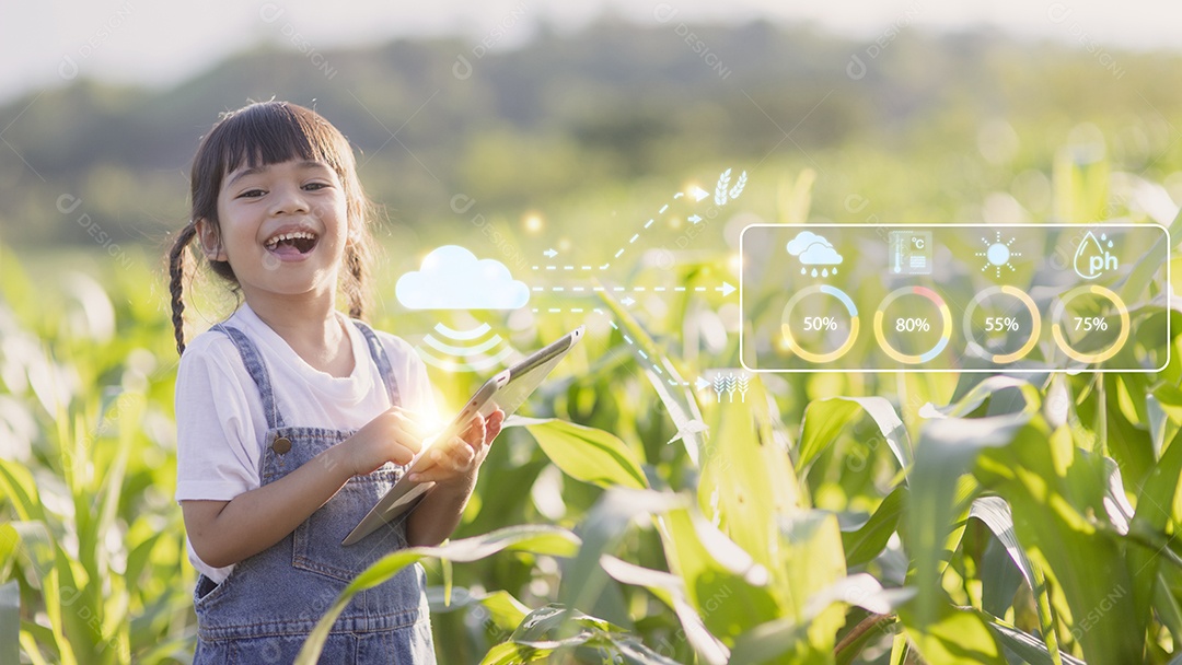A menina usando um tablet para analisar o crescimento das plantas