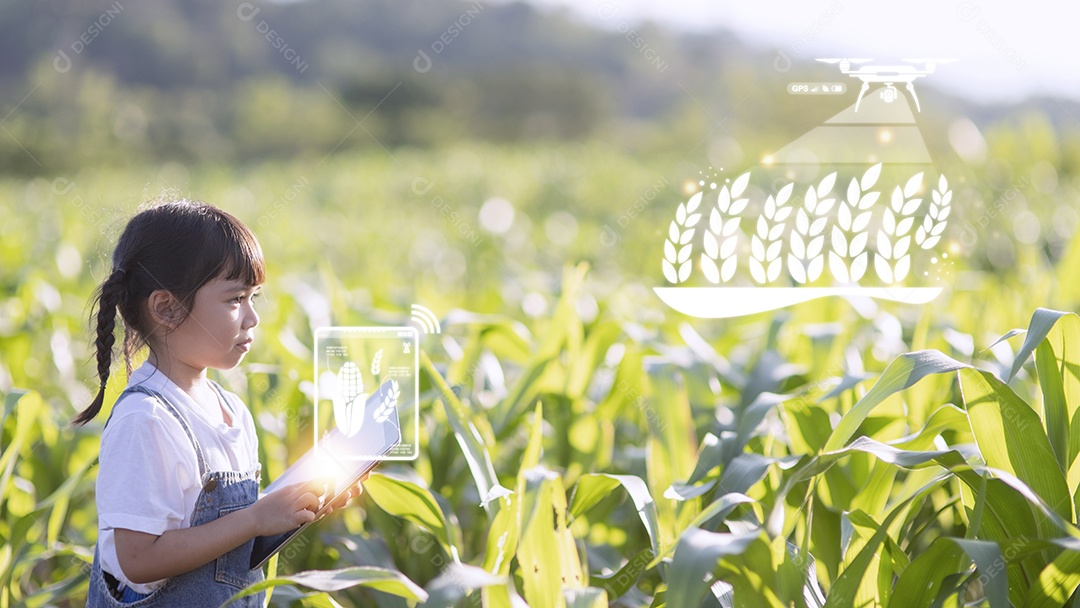 A menina usa um tablet para analisar o crescimento das plantas plantio