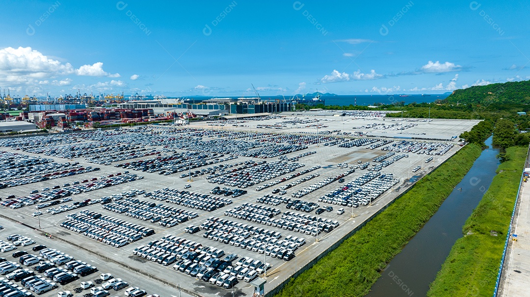 Lots of new cars pulling up to send to dealer or customer
