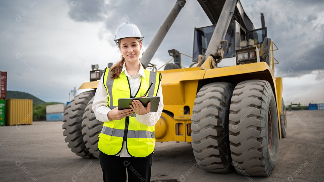 Woman foreman control forklift carrying container cargo