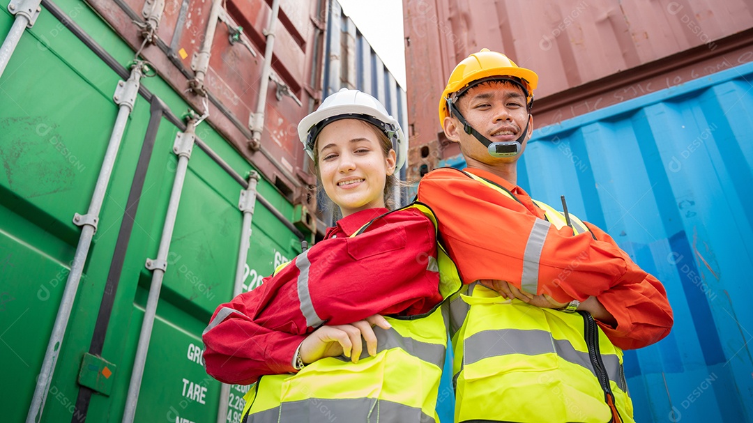 Woman manager and man cross arm in front of cargo forklift.