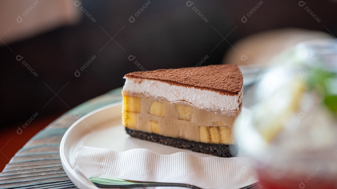 Fatia Cheesecake assada com chocolate cupuaçu cremoso.