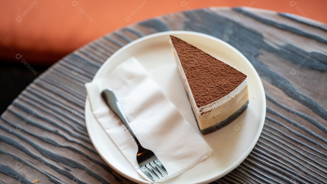 Fatia Cheesecake assada com chocolate cupuaçu cremoso.