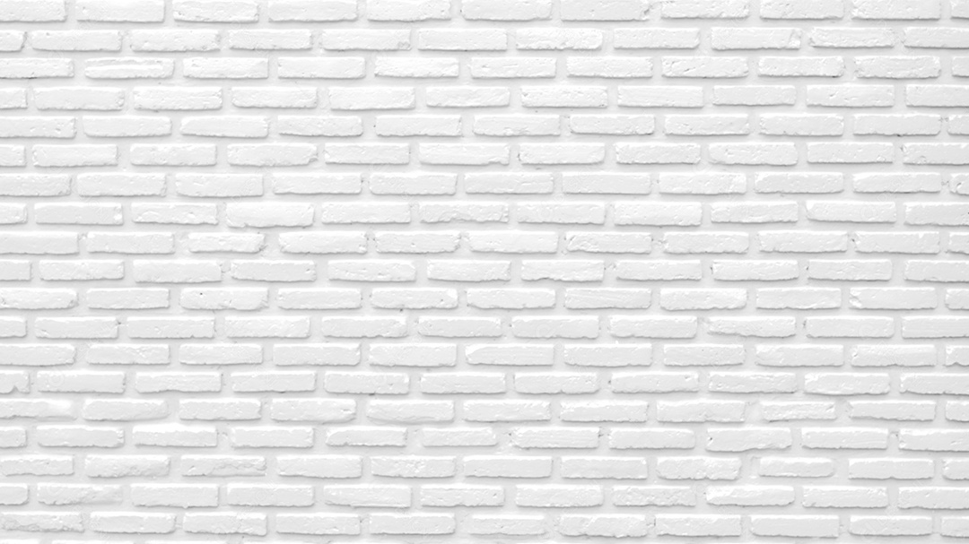Fundo de textura de parede de tijolo branco com espaço para texto.