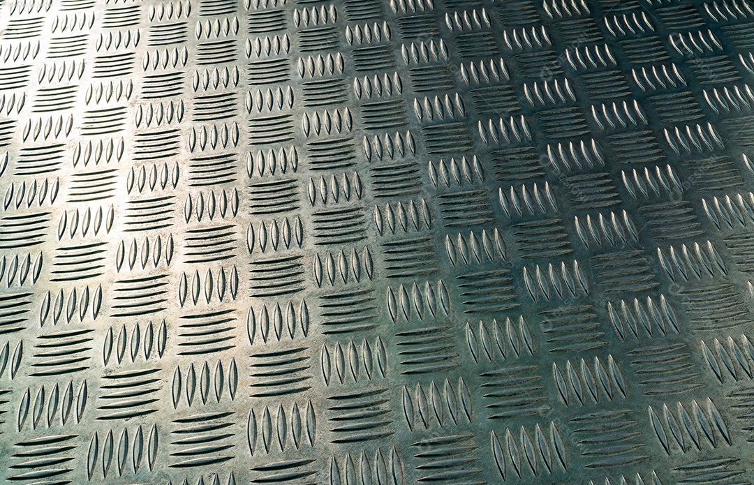 Placa de verificador de metal industrial. Parte traseira da textura da placa do verificador de metal