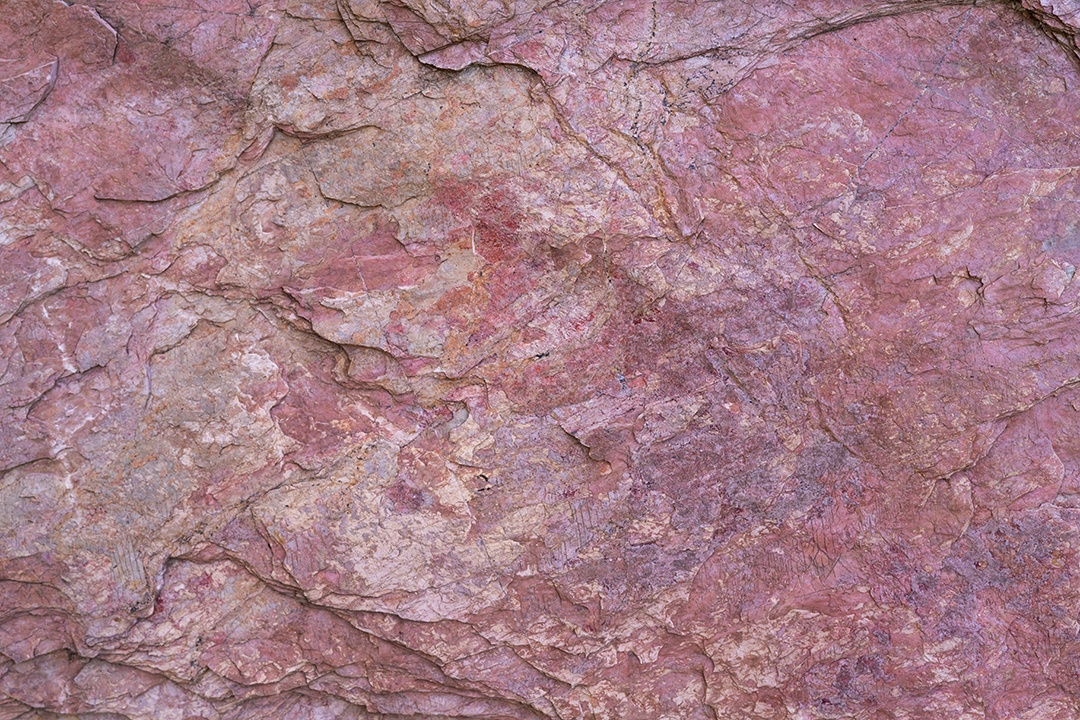 Fundo de textura de pedra com padrão único. Textura de pedra rosa.