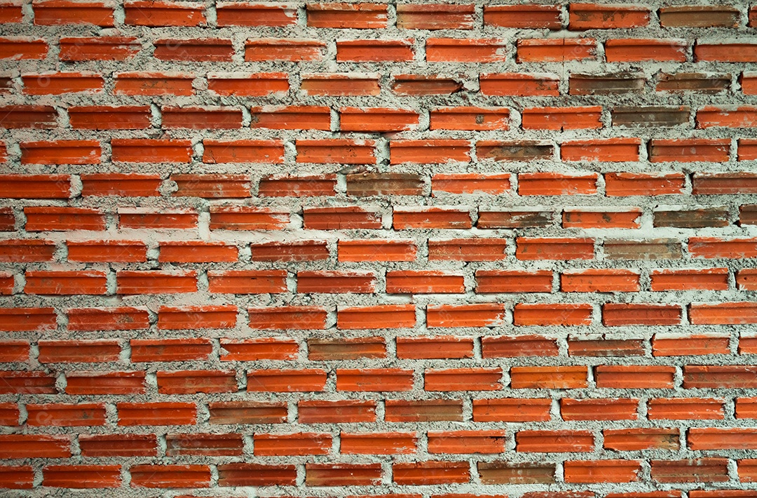 Fundo de textura de parede de tijolo vermelho e laranja. alvenaria para casa