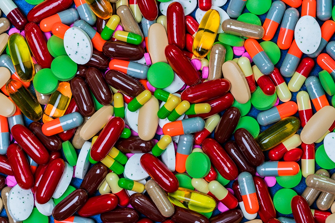 Quadro completo de pílulas coloridas de comprimidos e cápsulas.