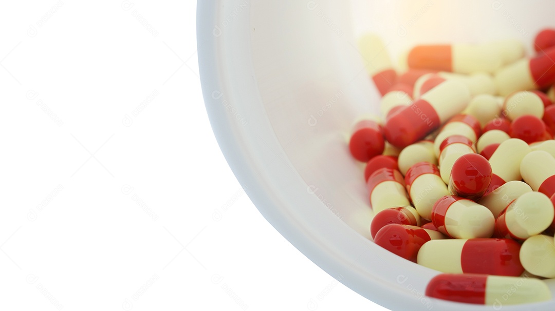 Pílula vermelha e amarela das cápsulas em frasco de plástico branco aberto