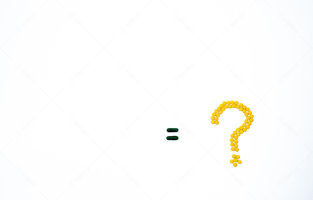 Ponto de interrogação feito de comprimidos revestidos de açúcar amarelo.