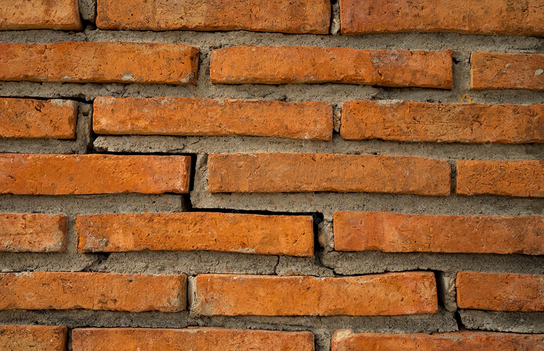 Fundo de textura de parede de tijolo laranja com espaço de cópia de texto.