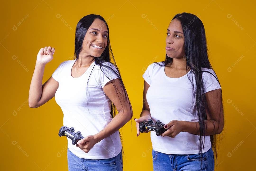 Beautiful female twin sisters playing