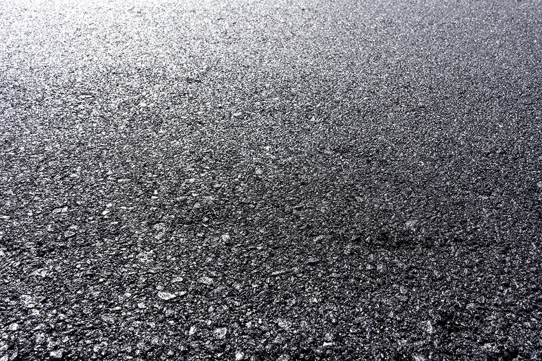 Textura da estrada nova do fundo do asfalto.