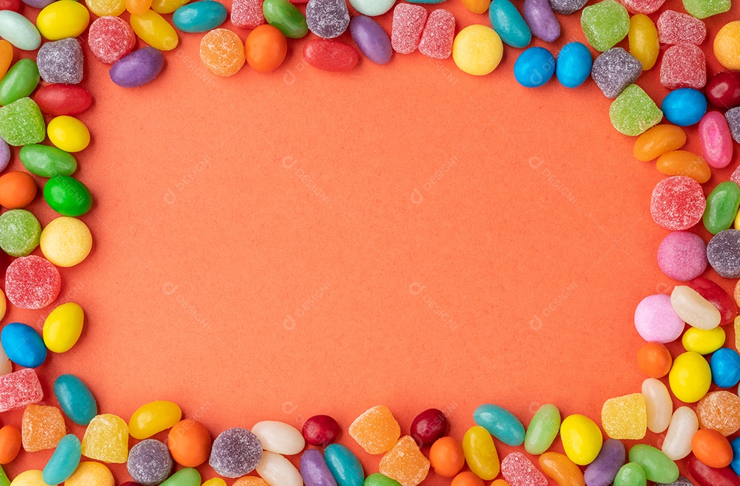 Quadro de doces coloridos sobre fundo laranja