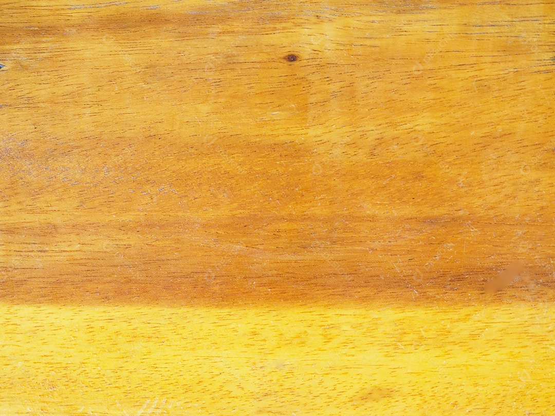 Piso de grão de madeira amarela para uso como fundo gráfico.