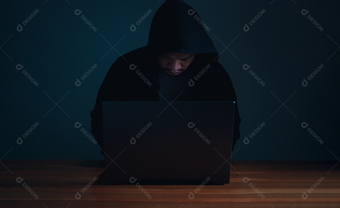 Hackers work on laptops in the dark. The concept of information.