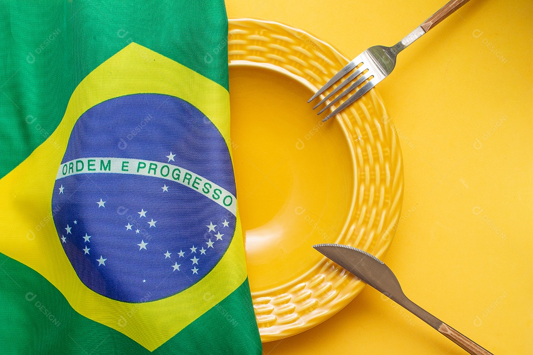 prato vazio com bandeira brasileira no topo - fome no Brasil