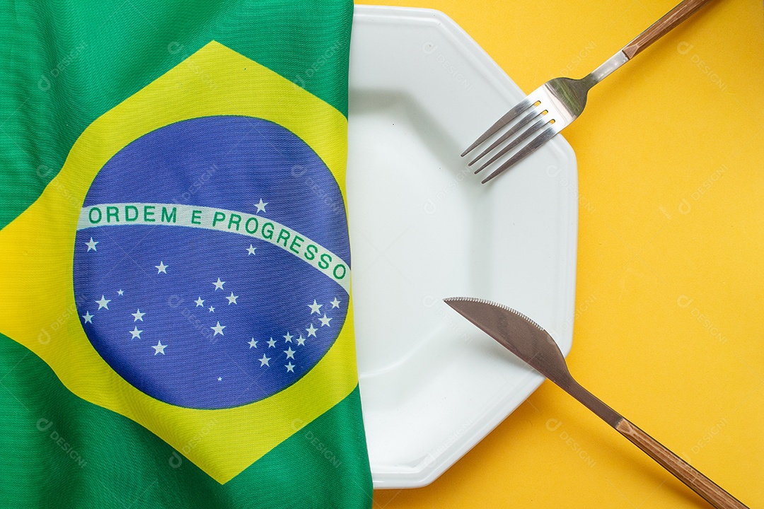 prato vazio com bandeira brasileira no topo - fome no Brasil