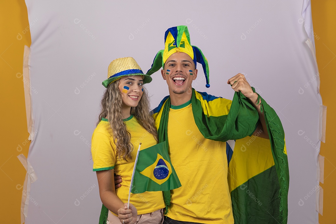 Brazilian young man and woman supporters world cup Football