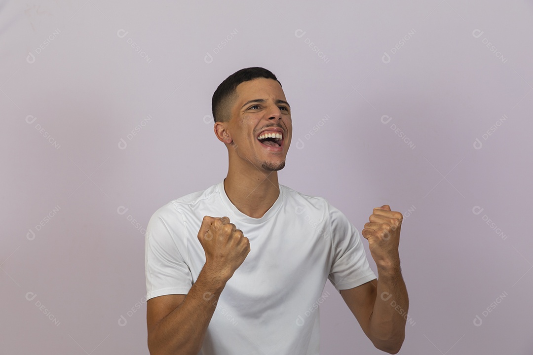 Brazilian young man smiling over white isolated background