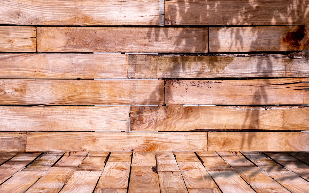 Lindo piso de madeira e fundo de madeira com sombra de folha,