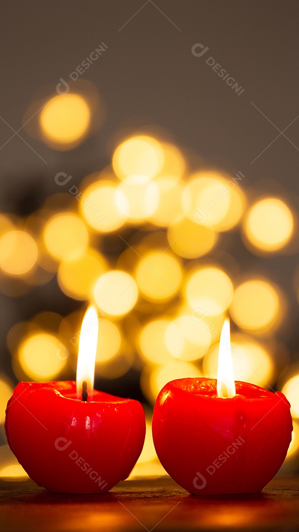 Atmosfera de Natal com duas velas e bokeh