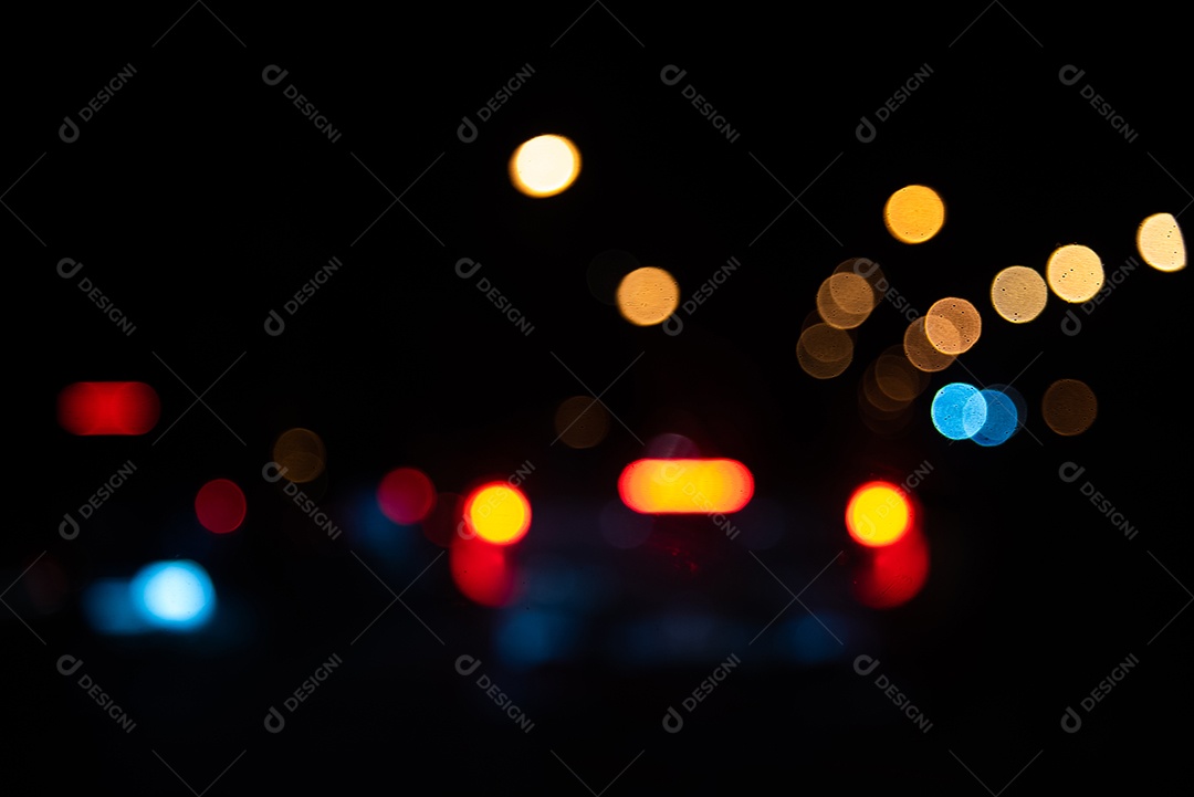 Desfocar o resumo do bokeh da noite clara do borrão no fundo.