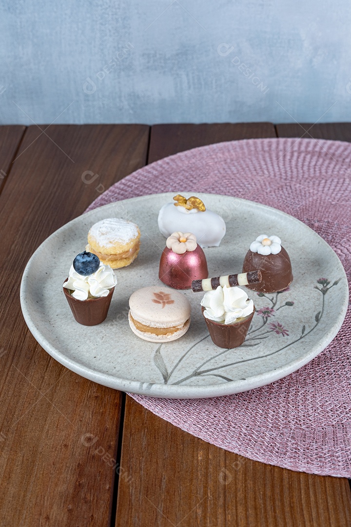 Sophisticated sweets for Brazilian weddings. Truffles, chocolate cups and macarons_top view.