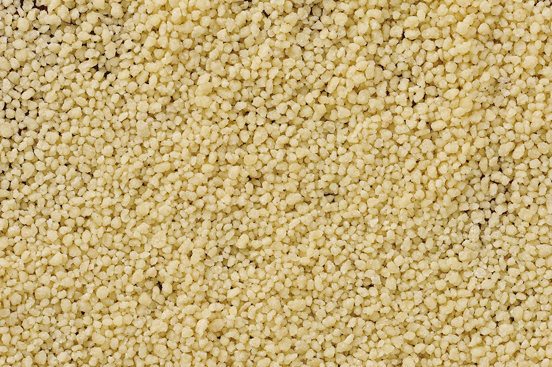 Fundo de grãos de cuscuz. Vista do topo.