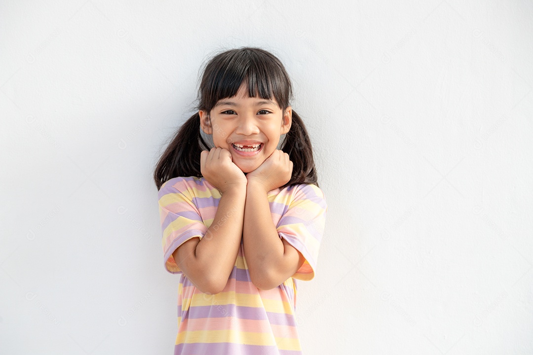 Portrait of a happy smiling child isolated on white background.