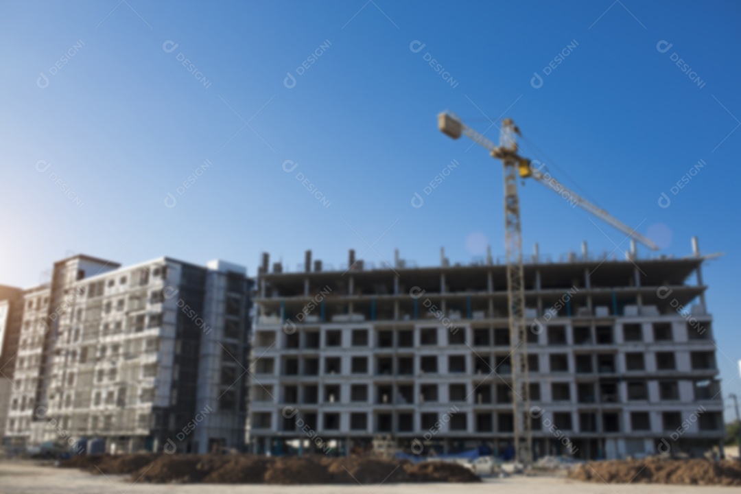 Construction site with cranes on sky background