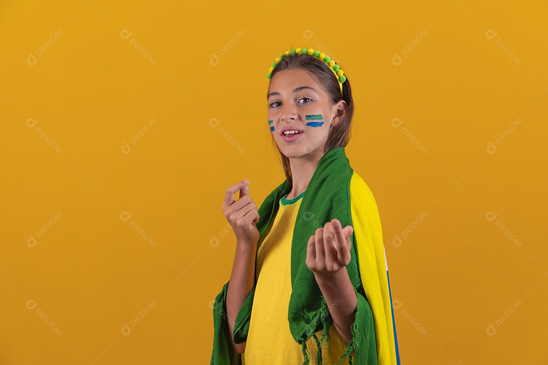 Beautiful young woman supporter of the Brazilian national team