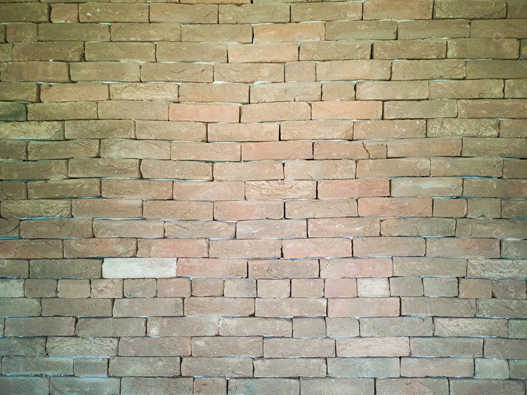 Fundo com detalhe de parede de tijolos.