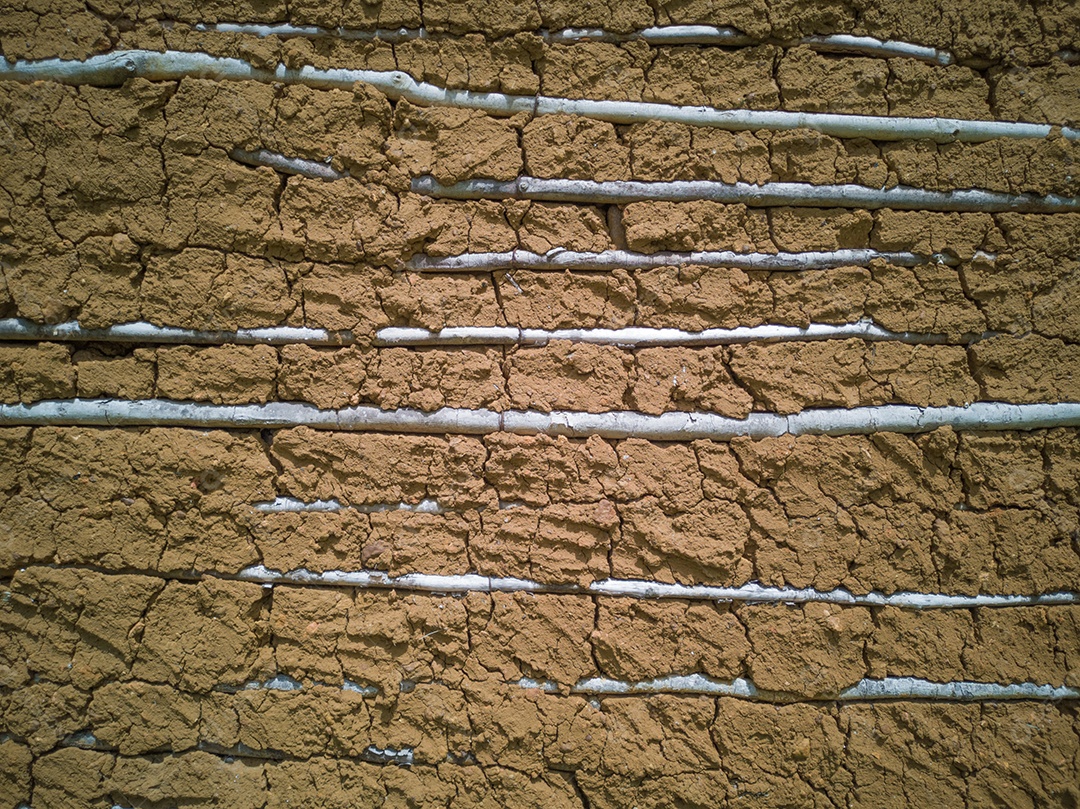 Fundo com textura de parede feita de lama.