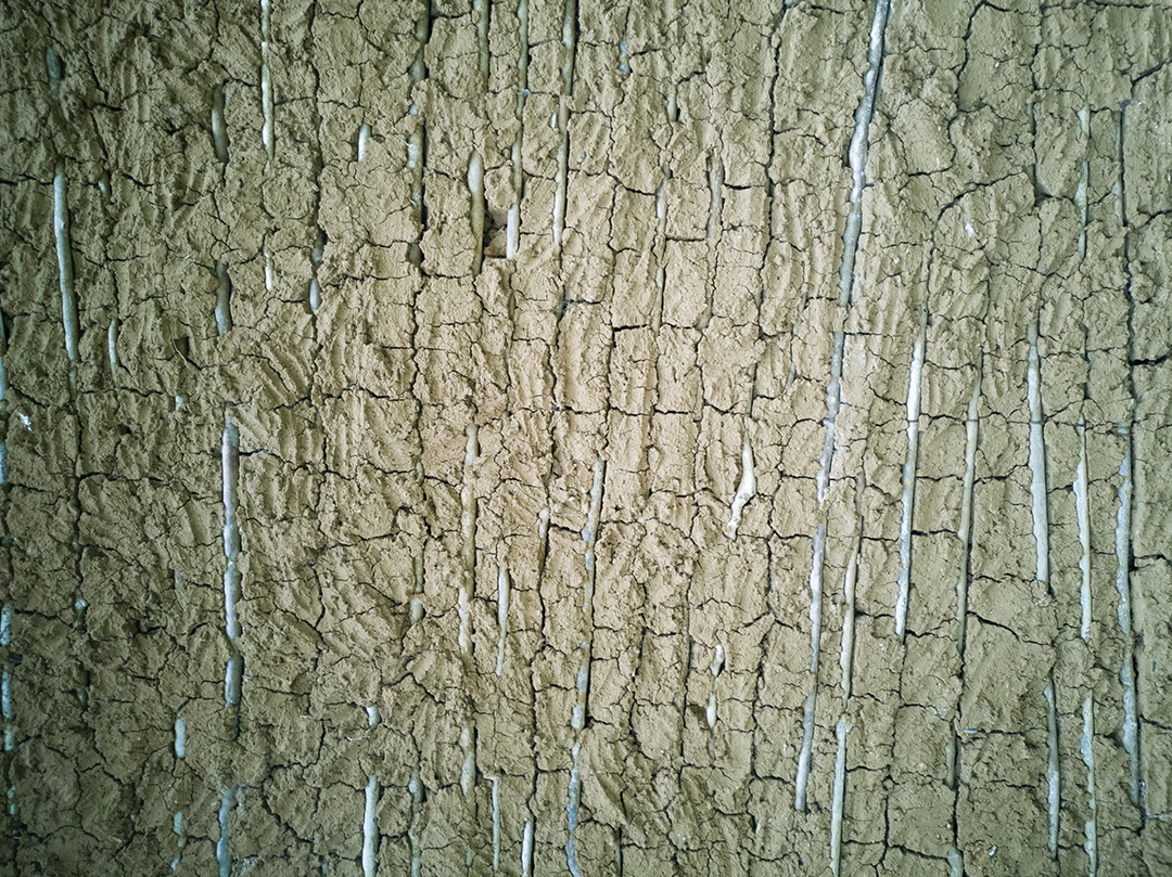 Fundo com textura de parede feita de lama.